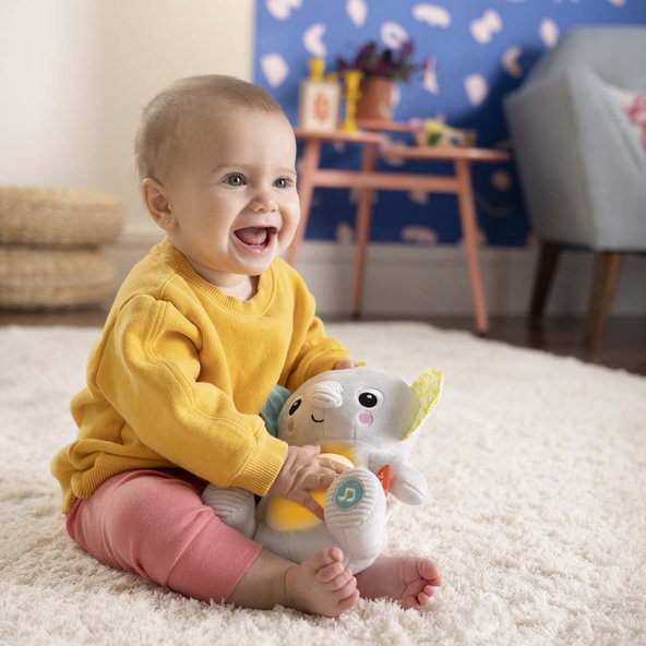 Bright Starts hudobná svietiaca plyšová hračka Hug-a-bye Baby sloník 0m+