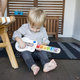 Baby Einstein Strum Along Songs™ Magic Touch™ HAPE gitara 12 m+