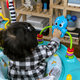 BABY EINSTEIN Skákátko/Aktivní centrum 2v1 Curiosity Cove™ 6m+
